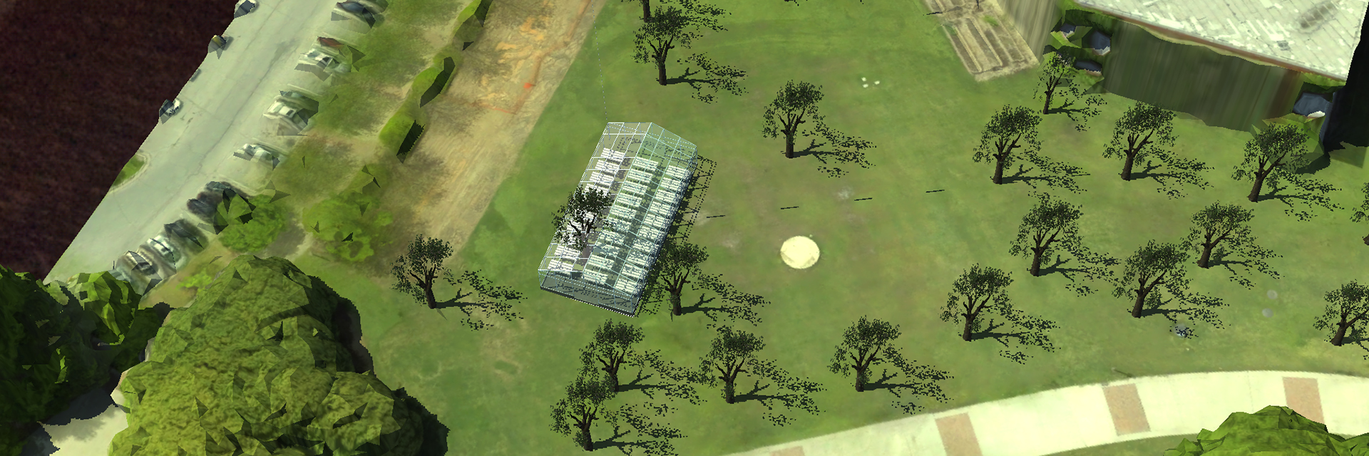 An illustration of an aerial view of a greenhouse on a grassy lawn.